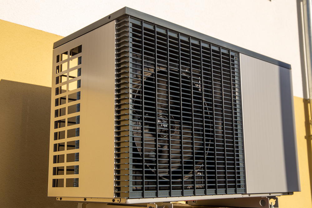 Air and water heat pump on a residential home Air and water heat pump on a residential home